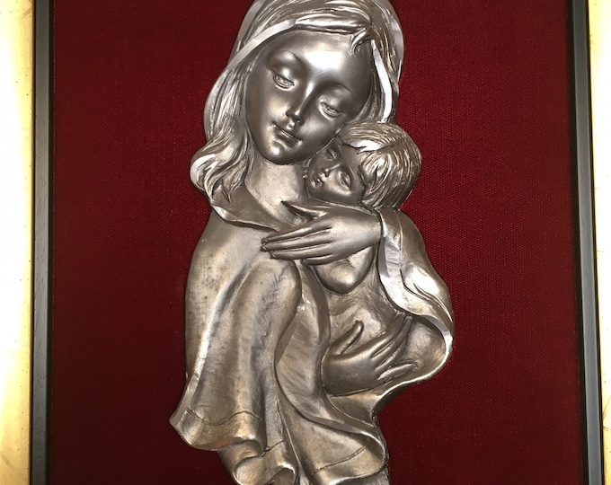 Painting religious icon Virgin to the child in etan on red velvet and golden frame