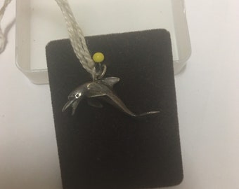Old silver dolphin pendant