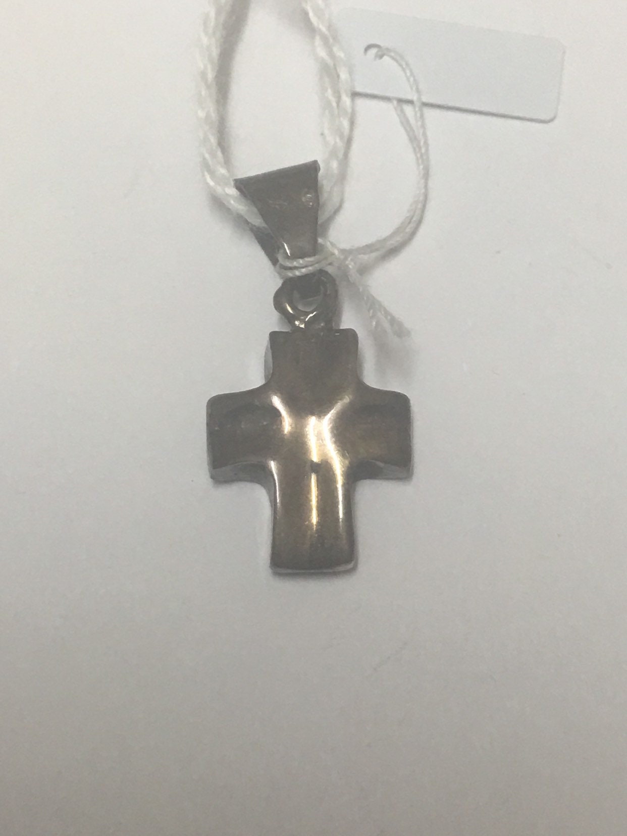 Religious medal in old silver small cross