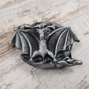 bat belt buckle metal gray black