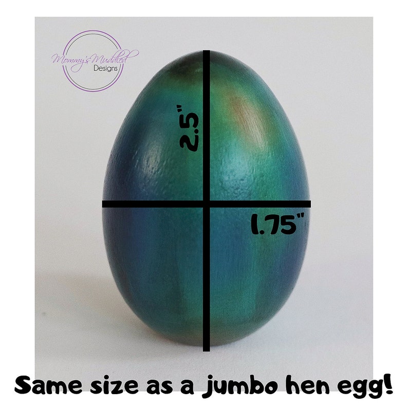 May include: A teal and green speckled egg with a black line down the centre. The egg is 2.5 inches tall and 1.75 inches wide. "Same size as a jumbo hen egg!" is written below the egg.