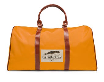 Orange vattentät reseväska med duffel | Läderdetaljer, Weekendväska, Handbagage