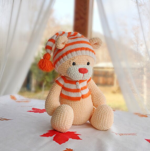 big teddy bear with cap