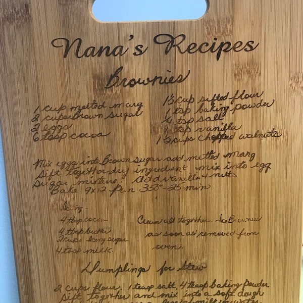 Cutting boards with hand written recipes or messages.