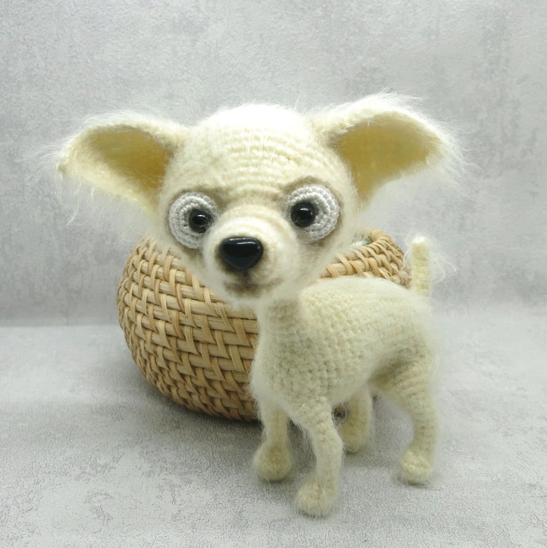 White crochet chihuahua is the best present for kids Amigurumi funny dog can be an interior toy or birthday gift for all.