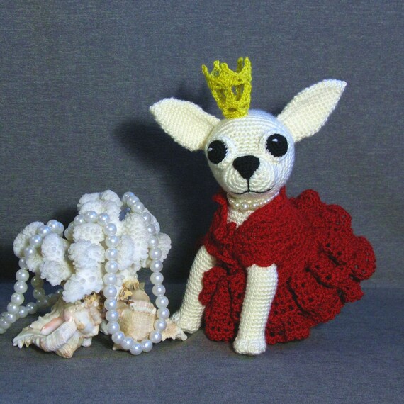 White crochet chihuahua is the best present for kids Amigurumi funny dog can be an interior toy or birthday gift for all.
