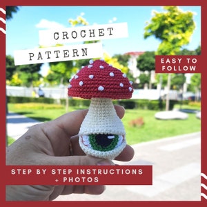 May include: Crochet pattern for a red and white mushroom with a green eye. The pattern includes step-by-step instructions and photos. Easy to follow.