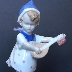Vintage Germany Porcelain Figurine: Girl with Guitar & Dancing Terriers