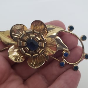 Vintage Sapphire Blue Rhinestone and Gold Washed Sterling Floral Brooch