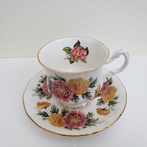 Unusual Vintage Paragon China Tea Cup and Saucer Set With Pink and Yellow Chrysanthemums and Gold Trim Details With Prairie Rose Inside Cup