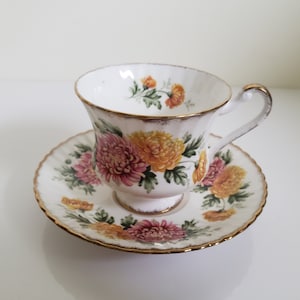 Vintage Paragon China Tea Cup and Saucer Set With Pink and Yellow Chrysanthemums and Gold Trim