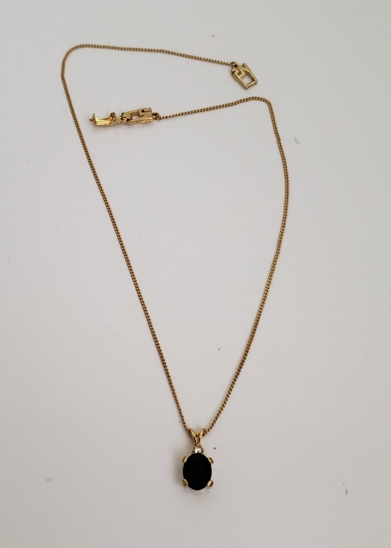 Bid Now: CHANEL MANCHETTE en résine noire et métal argenté rehaussée de strass (non signée) Diam Bid Now: CHANEL MANCHETTE en résine noire et métal argenté rehaussée de strass (non signée) Diam