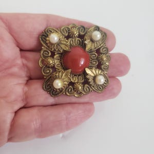 Vintage Repousse Brass Brooch: Carnelian Cabochon & Pearl Accents