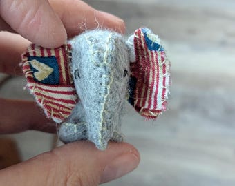 Tiny patriotic hand stitched wool felt elephant stuffy.