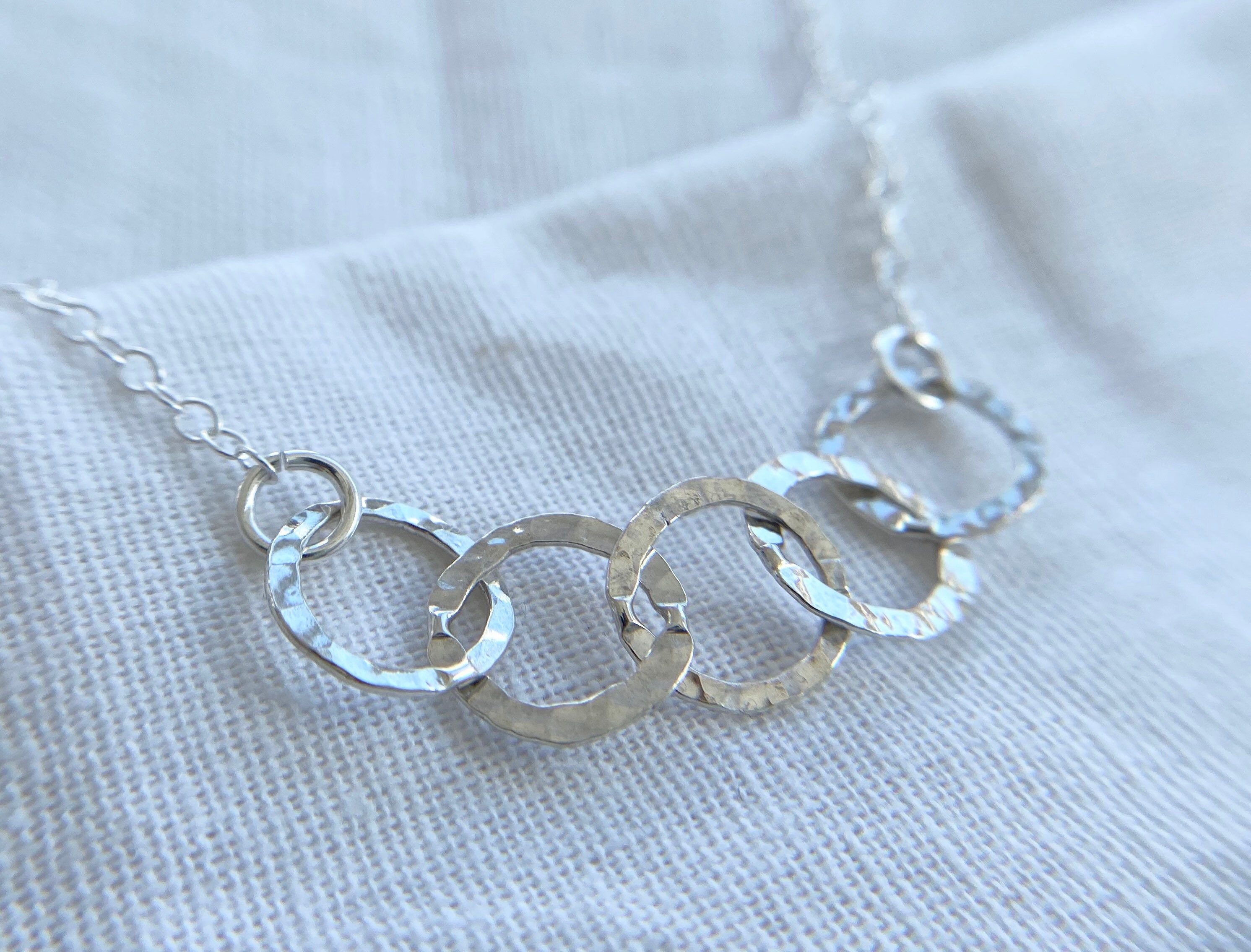 Five rings for five decades necklace Clearance