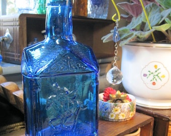Vintage Wheaton Glass Blue Botella grande Paul Revere 1775 en el frente y águila en la parte posterior