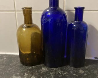 Apocathery bottles amber cobalt blue three bottle job lot found Mudlarking & bottle digging Scotland