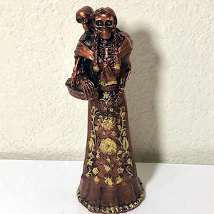 Catrina with Child on Back
