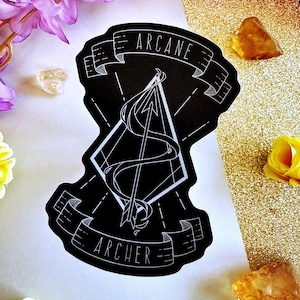 May include: Black and white sticker with an arrow and a ribbon that says "Arcane Archer".