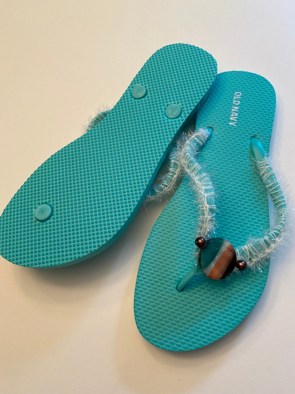 teal flip flops