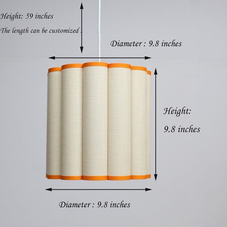 May include: A cylindrical lampshade with a cream-colored fabric and orange trim. The lampshade has a height of 59 inches and a diameter of 9.8 inches. The length can be customized.