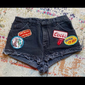 Vintage Patched Up Levi’s Black Denim Shorts