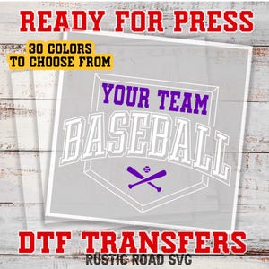 May include: A white baseball design with the text "YOUR TEAM BASEBALL" in purple and white. The design includes a baseball and crossed bats. The text "READY FOR PRESS" and "30 COLORS TO CHOOSE FROM" is at the top of the image. The text "DTF TRANSFERS" and "RUSTIC ROAD SVG" is at the bottom of the image.