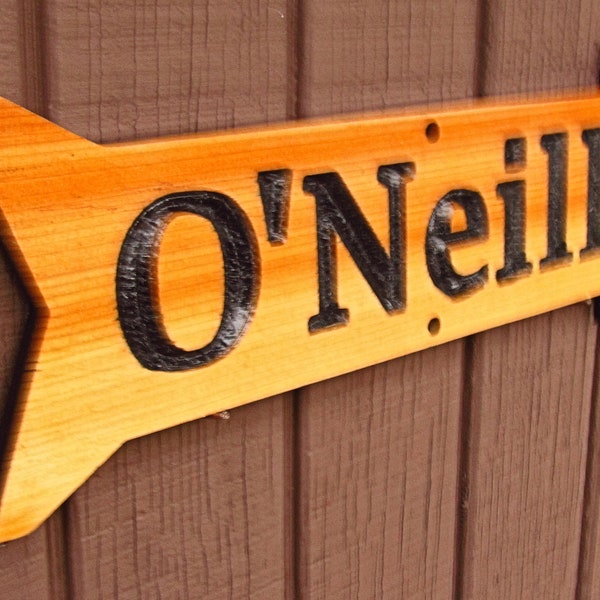 Cedar wood directional sign  in the shape of an Arrow with 2 mounting holes. (Top Center and Bottom Center)