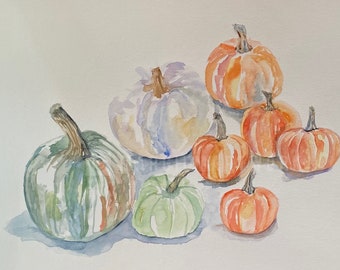 May include: Watercolor painting of various pumpkins in shades of orange, green, and white. The pumpkins vary in size and shape, with visible stems. The artwork has a soft, painterly style, perfect for fall decor.