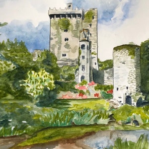 May include: Watercolor painting of a stone castle with a tower, surrounded by lush green trees and foliage. The castle is painted in shades of gray and brown, with hints of green ivy growing on the walls. The trees are a vibrant green, with some leaves painted in shades of yellow and orange. The painting is set against a cloudy sky.