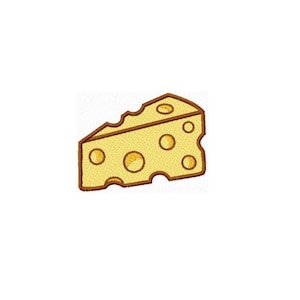 May include: A yellow wedge of Swiss cheese with a brown embroidered outline. The cheese features several circular holes of varying sizes on its top and side surfaces, rendered in a flat, two-dimensional style with a distinct stitched border.