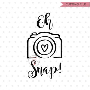 May include: Black and white illustration of a camera with a heart in the lens and the text "Oh Snap!"