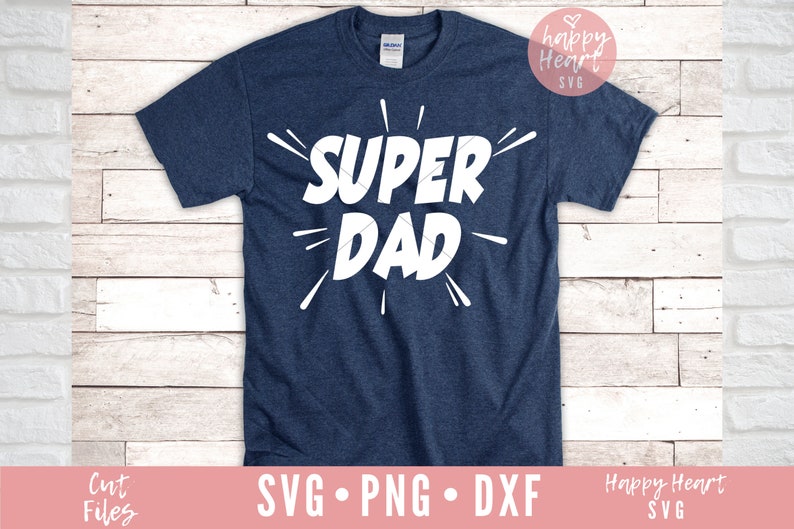 K&ouml;nnte beinhalten: Ein marineblaues T-Shirt mit dem Text "SUPER DAD" in Wei&szlig;, mit einem wei&szlig;en Sternenausbruch-Design um den Text.