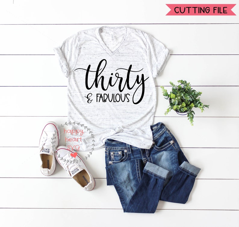May include: A white t-shirt with a black graphic that says "thirty & fabulous".