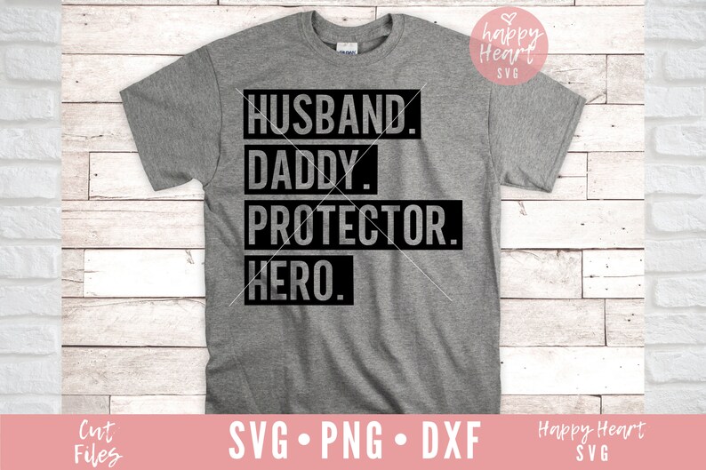 May include: A gray t-shirt with black text that reads "Husband. Daddy. Protector. Hero."