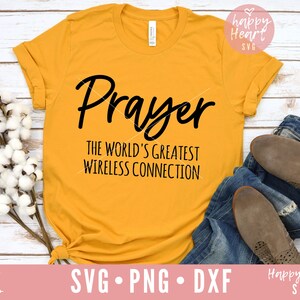 May include: A yellow t-shirt with the text "Prayer The World's Greatest Wireless Connection" in black lettering.