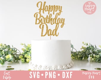 May include: Gold glitter cake topper with the text "Happy Birthday Dad". The topper is on top of a white frosted cake.