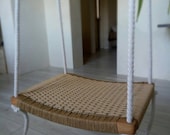 Swing with a wicker seat
