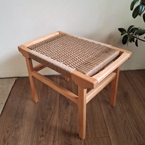 Bench with wicker seat. 61cm ×38cm