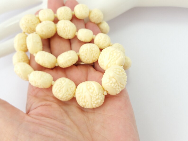 Faux ivory celluloid necklace unusual carved style moulded early plastic graduated bead necklace