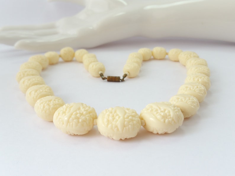 Faux ivory celluloid necklace unusual carved style moulded early plastic graduated bead necklace