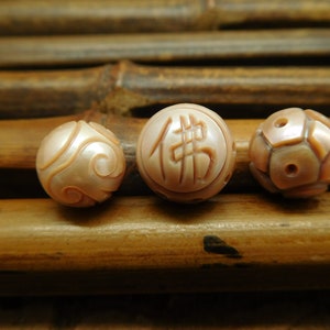 Drilled half of bead. Carve pearl bead. pearl bead. buddha carve pearl. crystal carve. women jewelry. pearl jewelry