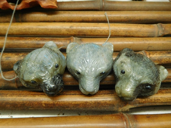Carved Labradorite Animal Pendants Carved Labradorite Animal Pendants