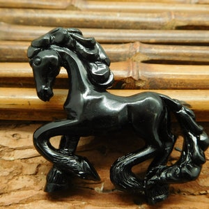 Obsidian caved horse decoration. black stone carving horse pendant. vivid craft horse. horse decoration. horse decoration