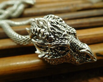 Dragon pendant. alloy dragon charm. flying dragon necklace stainless. mythical protection amulet. dragon with green eye chain