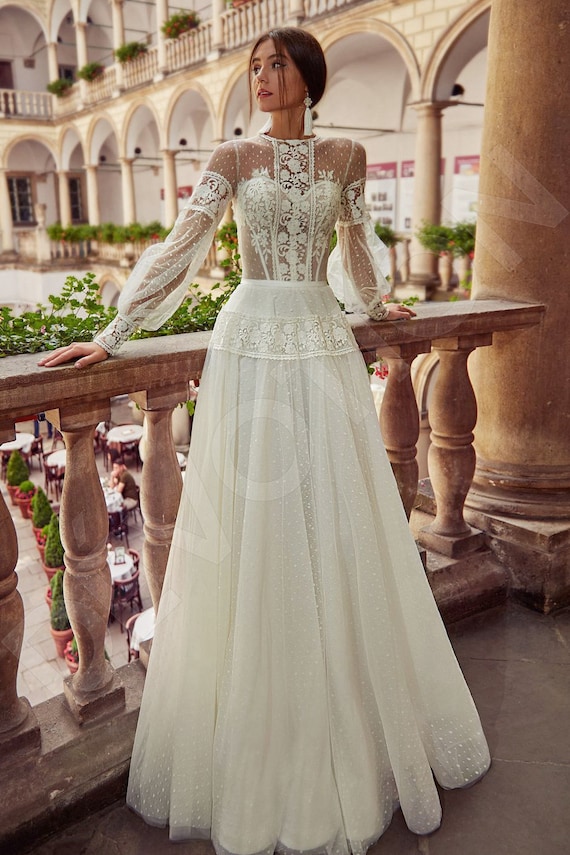 Individual Size A-line Silhouette Alsena Wedding Dress. Modern