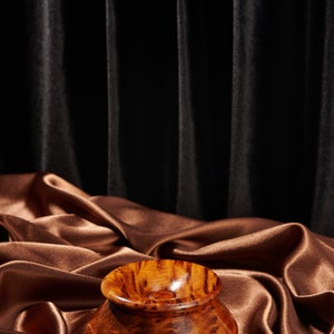 Functional Thuya wood ashtray featuring removable top