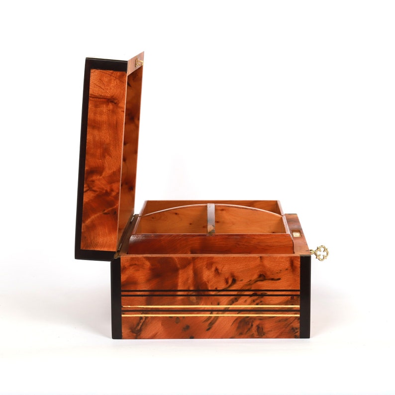 Open thuya wooden box with a side view, showcasing the beautiful wood grain patterns and unique inlaid cedar wood accents