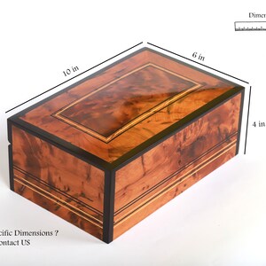 the dimensions of the thuya keepsake box, 10 inches length by 6 inches width and 4 inches height.