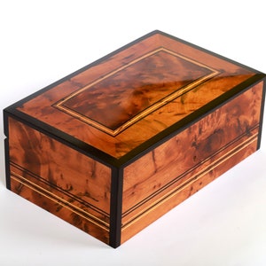 Hand-carved thuya wooden jewelry box with beautiful burl pattern, inlaid with black and yellow cedar wood engraved lines on the top and the sides